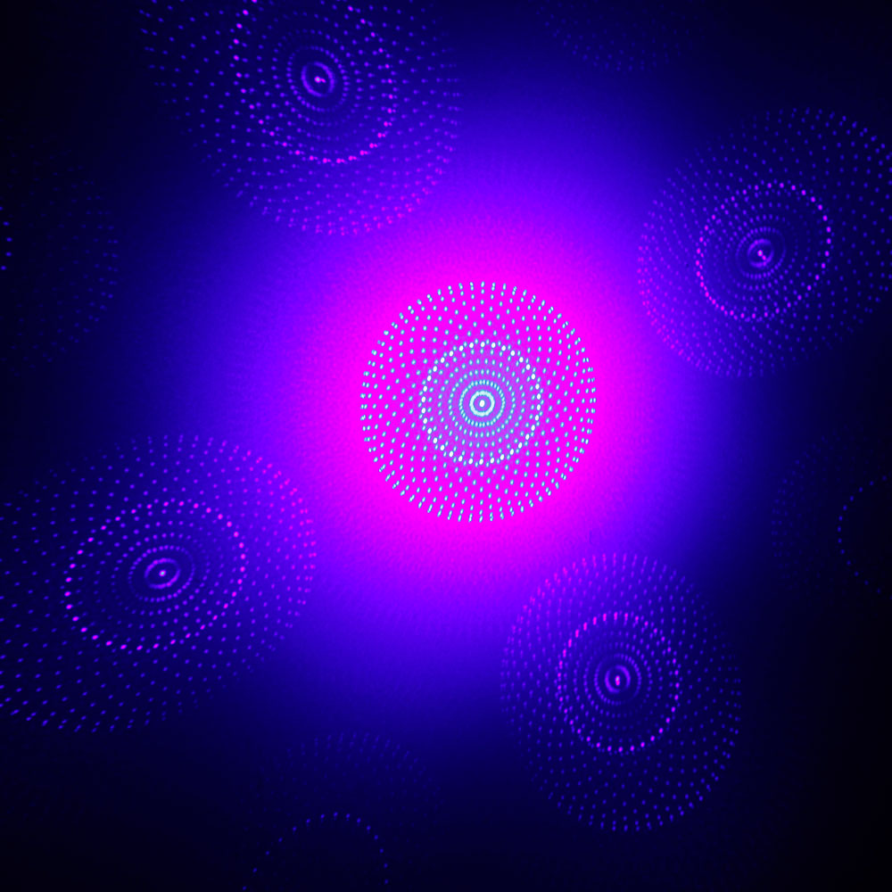 Alcance láser de luz azul de cinco cabezas de 10000 mW negro